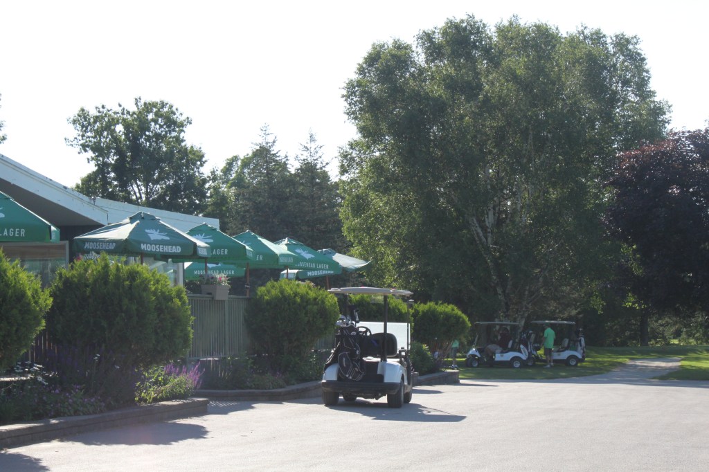 Clubhouse and golf cart