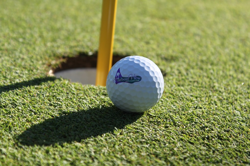 Golf ball near hole
